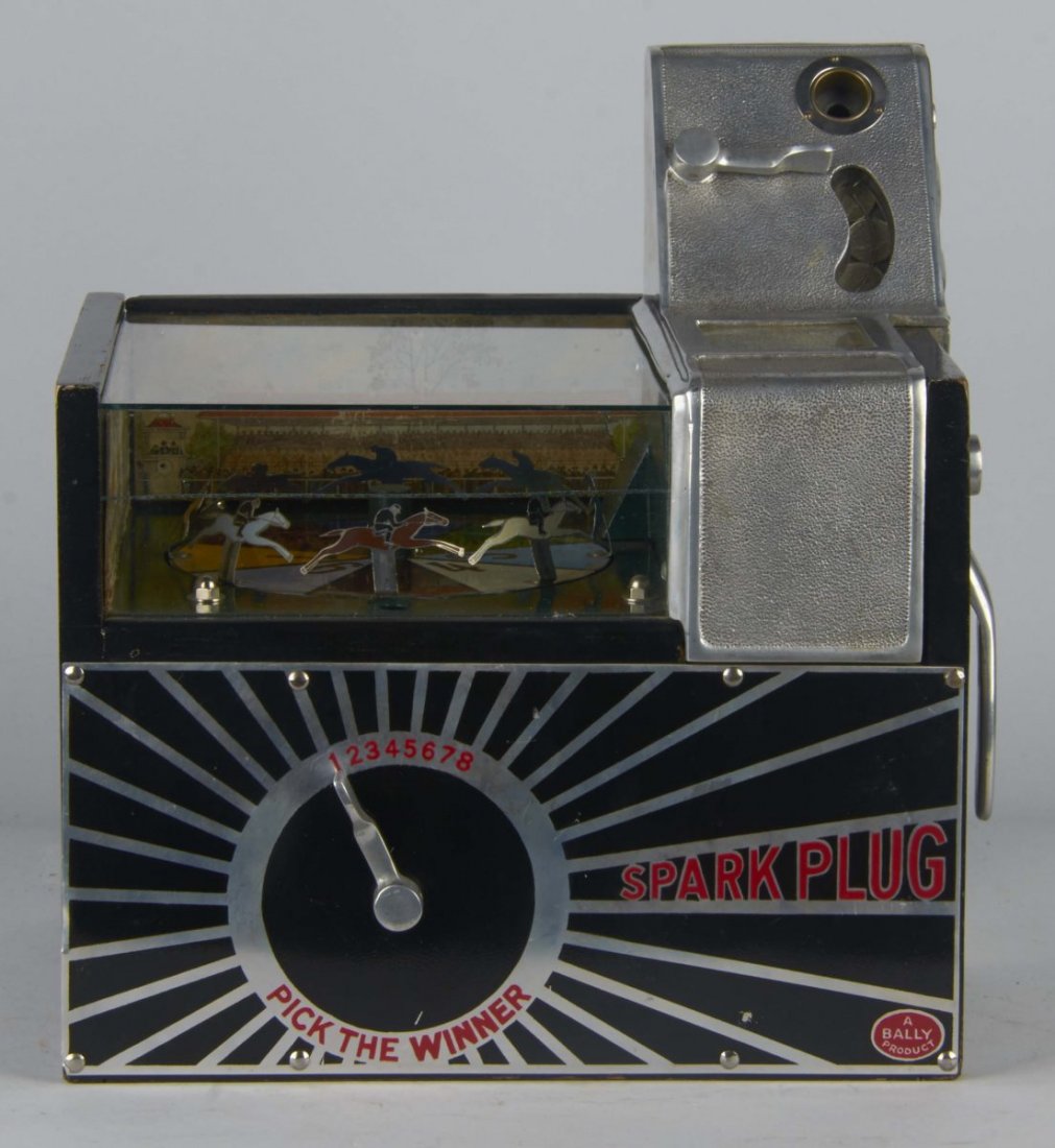 5 ¢ Bally's Spark Plug Horse Race Payout Machine: With key. Circa 1934, Bally Manufacturing Co. Machine pays random reward of 1 to 20 coins. Condition (Excellent). Size 13-1/2" x 10-1/2" x 14-1/2"