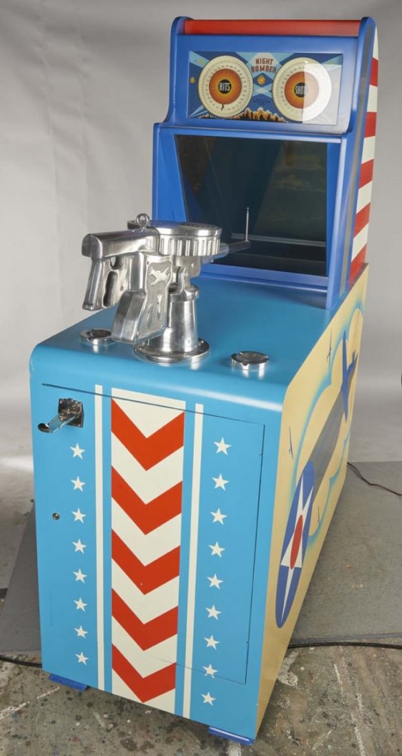 5 ¢ Success Mfg. Corp. Night Bomber Arcade Game: Arcade game has dial counting number of shots fired and number of hits. Game cabinet has patriotic theme. Includes keys. Condition (Restored). Size 66" x 26" x 76" CORRECTION: Powers up and works.