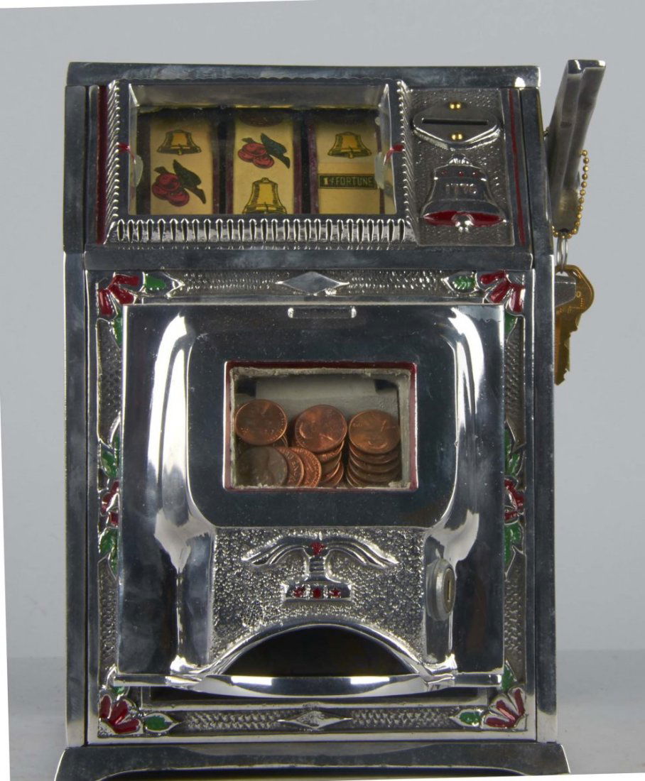 1 ¢ Jackpot Puritan Baby Bell Trade Stimulator: This countertop slot machine type trade stimulator in colorful cast case features jackpot and includes keys. By Midwest Novelty Co. circa 1930s. Small glass panel on side is cracked. Condition (Excell