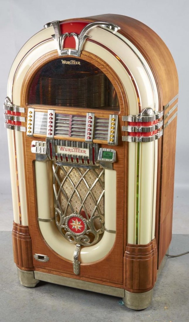 Multi-Coin Wurlitzer Jukebox Model 1015: Excellent restoration features 24 selections and plays 78 rpm records. Jukebox is currently stocked with records. Light up front plastics are nearly flawless and wood cabinet shows plaque with serial 