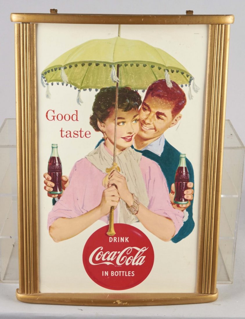 Framed Coca Cola Poster: Print lithograph Coca Cola poster in original wood frame, which is painted gold. Poster reads,"Good Taste. Drink Coca Cola in Bottles." Condition (Excellent). Size 16" x 24"