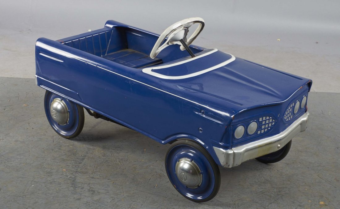 Pressed Steel Murray Pedal Car: Beautifully restored in blue and white. Does show a few small chips in the paint. Circa late1960s. Body style resembles that of the Lancer, Lark, Tee Bird, or Ranger. Condition (Restored). Size 33" x 