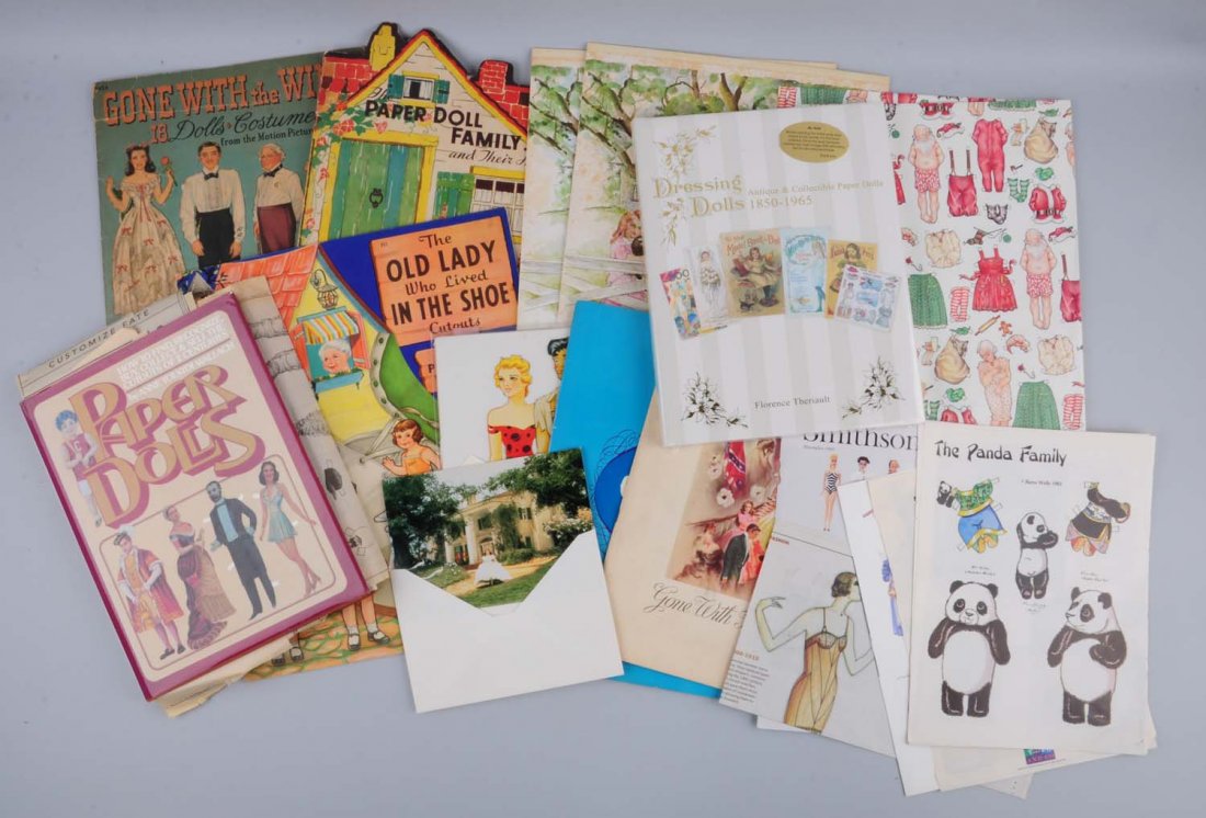Assorted Lot Of Vintage Paper Dolls.: "Gone With The Wind" 1940 set, paper doll family - 1944 "The Old Lady That Lived In The Show" 1940 and more, some are cut. Condition (Fair - Good). Size Largest: 17" T.