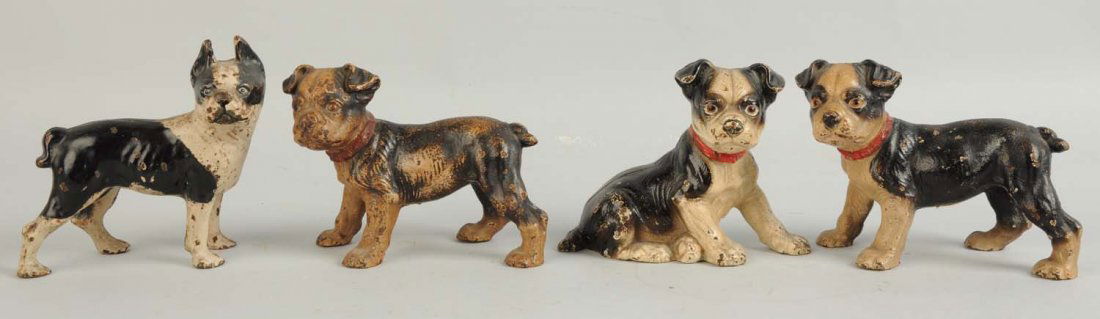 Cast Iron Assorted Boston Terrier Dog Doorstops.: Two standing and one sitting Boston Terrier, Hubley; One standing Boston Terrier, Vindex. Condition (Good - Very Good). Size 4 - 3/8" T.
