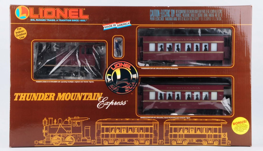 Lionel G Scale 81001 PRR Train Set OB.: Set consists of one locomotive, two passenger cars, a figure and a transformer. There is no track in this set. Complete like new in original box.