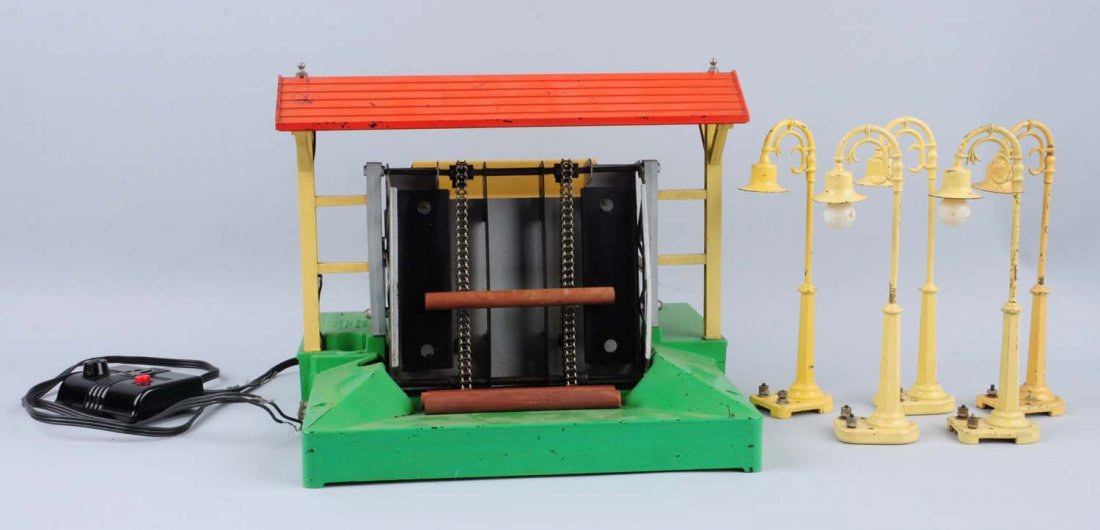 Lionel 164 Lumbar Loader & Five Street Lamps.: 164 lumber loader has original control button, some scratches and paint chips throughout. Very good condition. Five yellow street lamps, all have some scratches and paint chips. One has a cracked lens