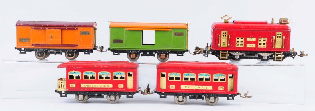 Lionel 248 Red With 529, 530, Pas. Cars, & 2 805.: 248 electric outline locomotive has been re-wheeled, otherwise complete, all original, has scratches and paint chips throughout. 529 red passenger car is complete, all original, and has some scratches