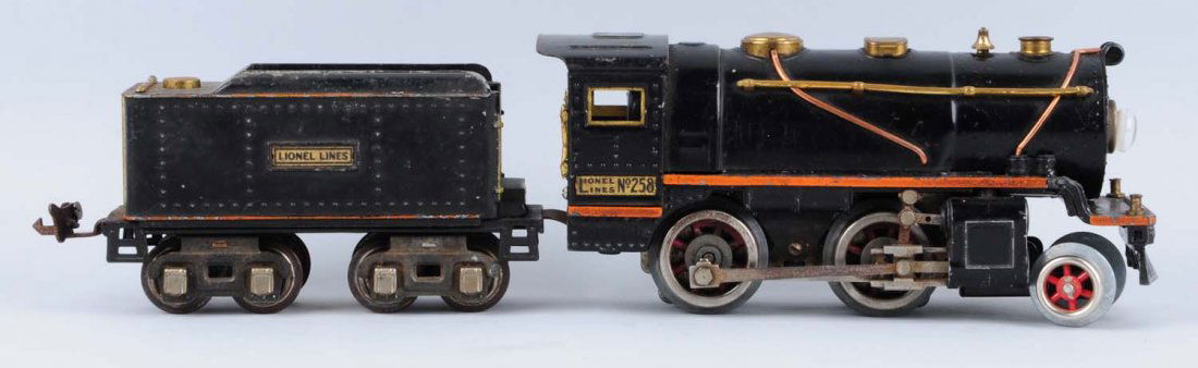 Lionel Early 258 Locomotive Tender.: Locomotive replaced front truck has a little corrosion on side rodes. Has some scratches and paint chips. Tendor has some scratches and paint chips. Good condition.