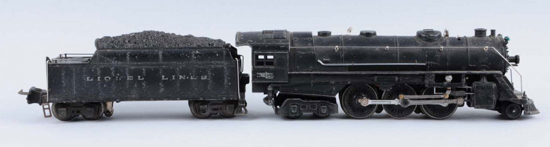 Lionel 226E With 2235W Tender.: Not correct tender for this locomotive. A little dusty with some paint chips, in good condition. Tender is complete and all original in good condition.