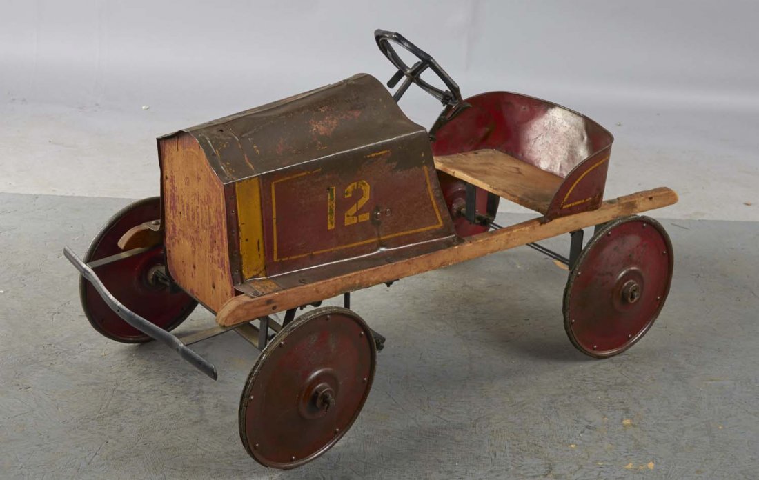 Early Pressed Steel & Wood No. 12 Pedal Car: Resembles the 1930s American National Packard pedal car. Condition (Fair). Size 38" x 18" x 22"