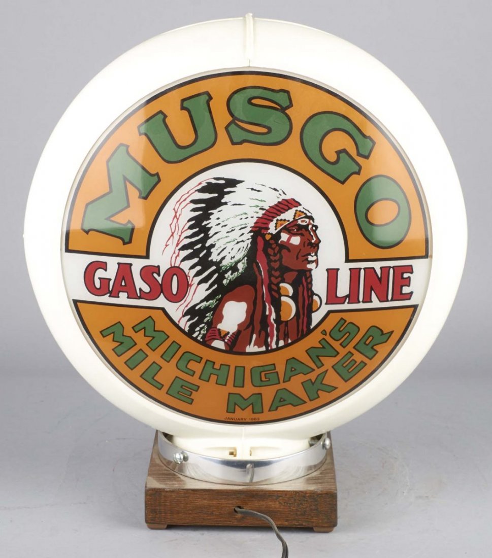 Musgo Gasoline Indian Head Gas Pump Globe: This double sided globe on light up base features 2 glass lenses marked January 1983 in white plastic surround. Both lenses feature Indian head and read "Michigan's Mile Maker". Condition (Excellent).