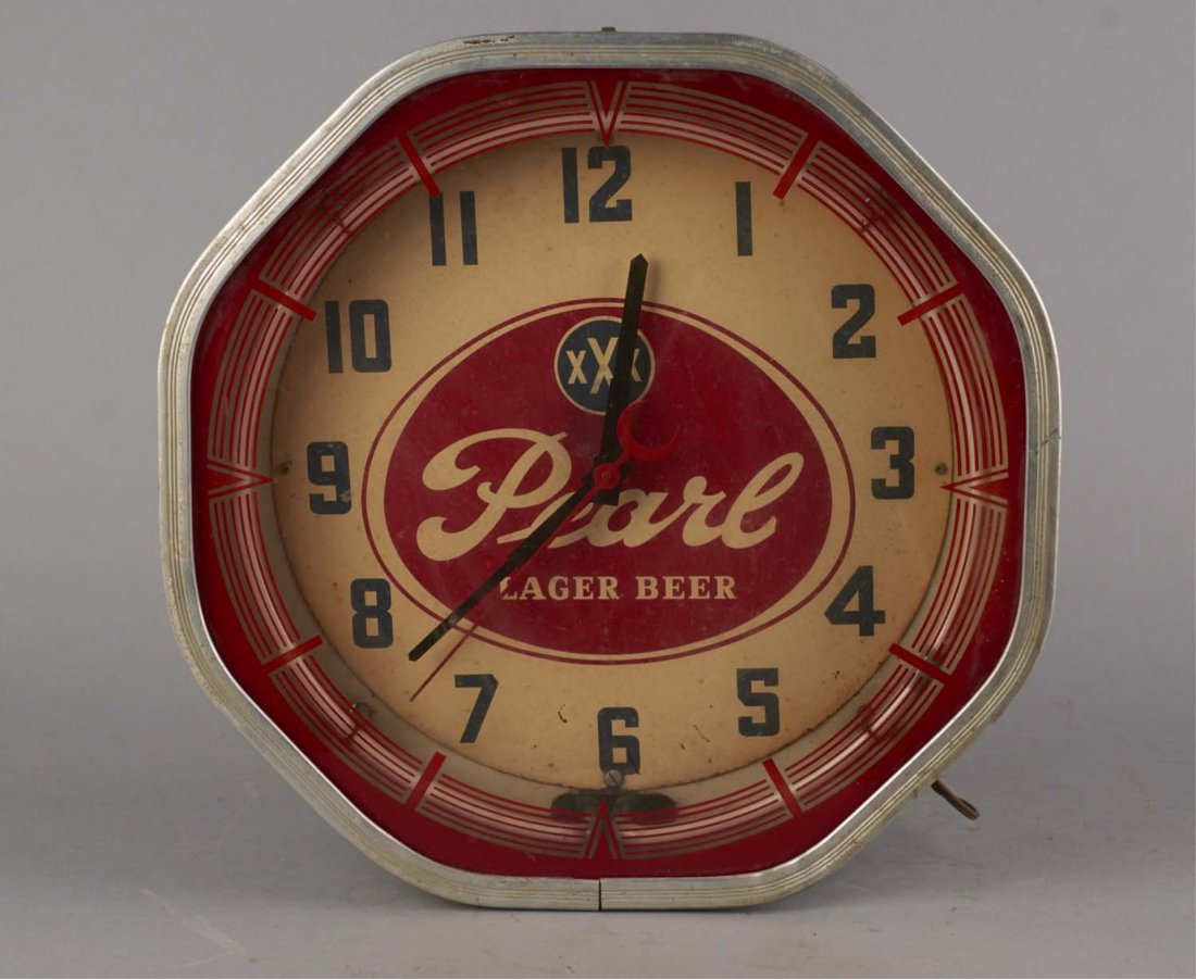 Pearl Lager Beer Neon Advertising Wall Clock: This octagonal hanging wall clock with attached transformer, metal frame, and reverse on glass front shows some wear throughout. Condition (Good). Size 18" x 7" x 18"