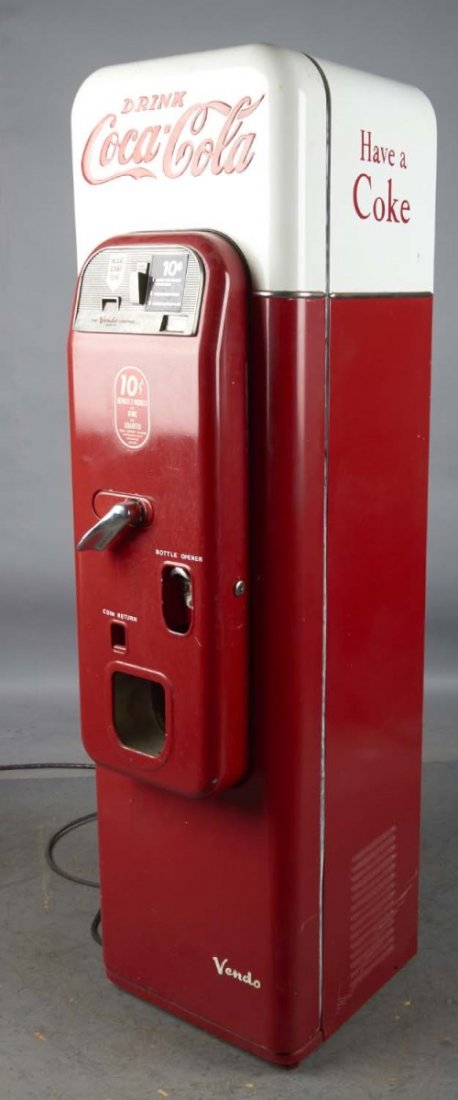 Coca Cola Vendo 44 Stand Up Soda Vendor: Machine is an older restoration. Includes keys. Condition (Restored). Size 58" T.