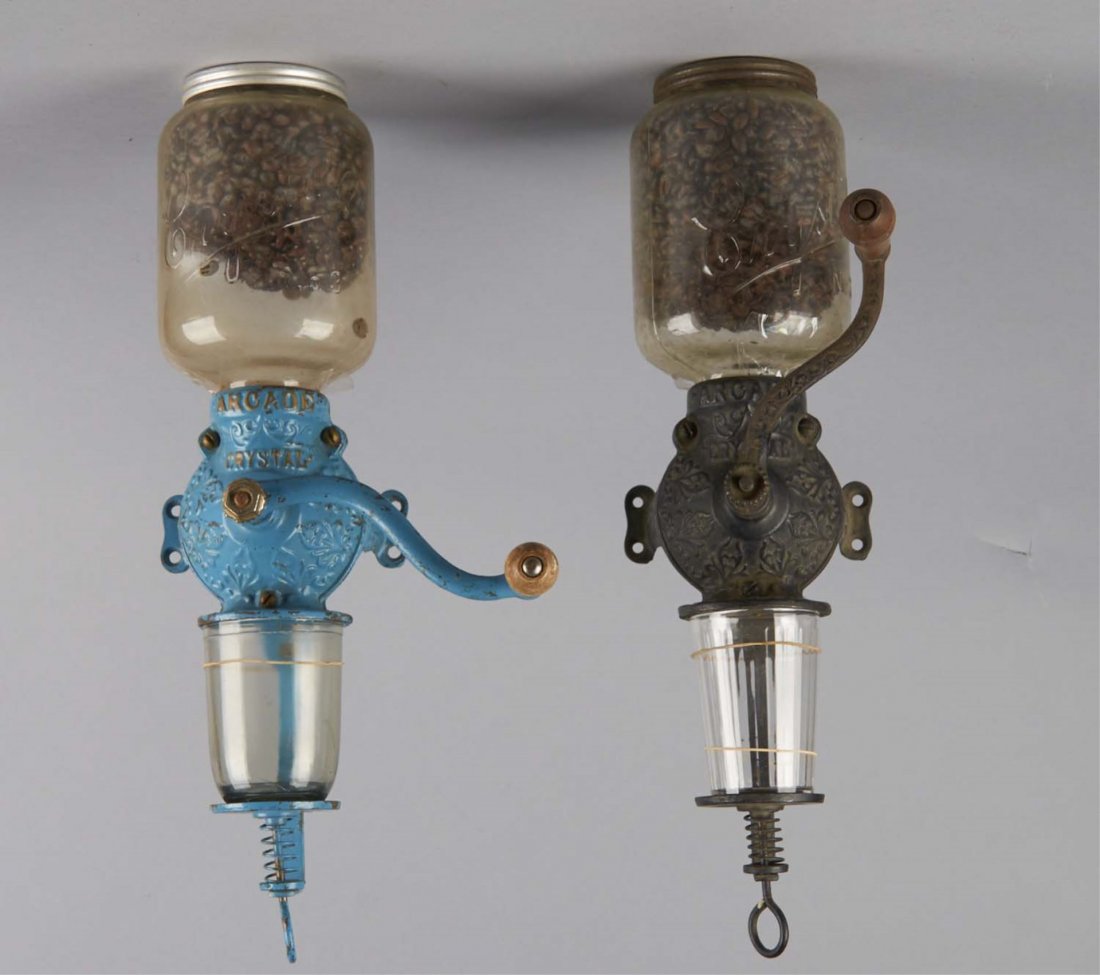 One Arcade Crystal No. 3 Coffee Mill Grinder: Cast iron wall mount coffee mill with Arcade Crystal No. 3 glass. This ornate piece was made by Arcade Mfg Co U.S.A., painted blue and adorned with "ARCADE" molded in to the body. The top glass hopper