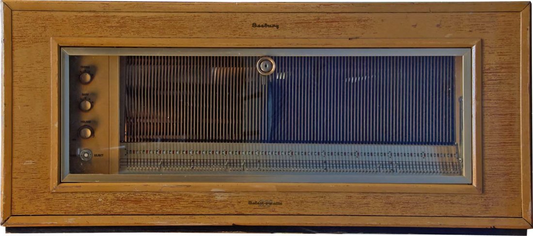 Seeburg Select-O-Matic 200 Library Unit Jukebox: Rare Model 200LU1-PS in blond wood and glass cabinet. Restored mechanism in good cabinet. Excellent playing. Condition (Very good). Size 17" x 17-1/2" x 38-1/2"