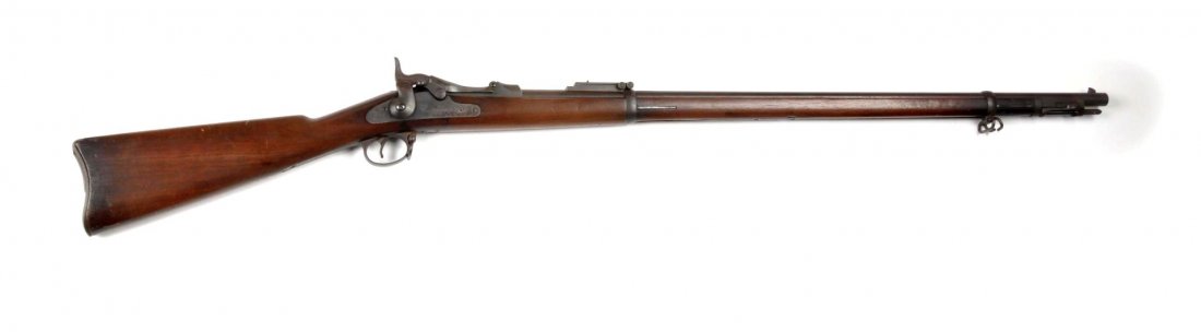 Springfield Model 1884 Trapdoor Rifle.: Serial # 511698 Standard Model 1884 trapdoor rifle features a 32-5/8" barrel, chambered for the .45-70 govt cartridge. Excellent stock with no cracks and the Samuel Porter 1891 cartouche. "N.G.B." sta