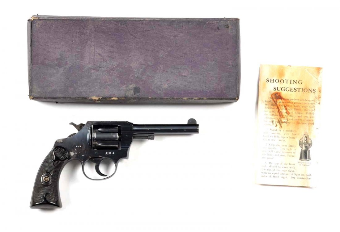 **Colt Police Positive Double Action Revolver.: Serial # 236690 This standard revolver was manufactured in 1938. Standard features a 4" barrel, blued finish, six shot, double action, .32 caliber, and Colt gutta percha grips. Barrel has wear at muzz
