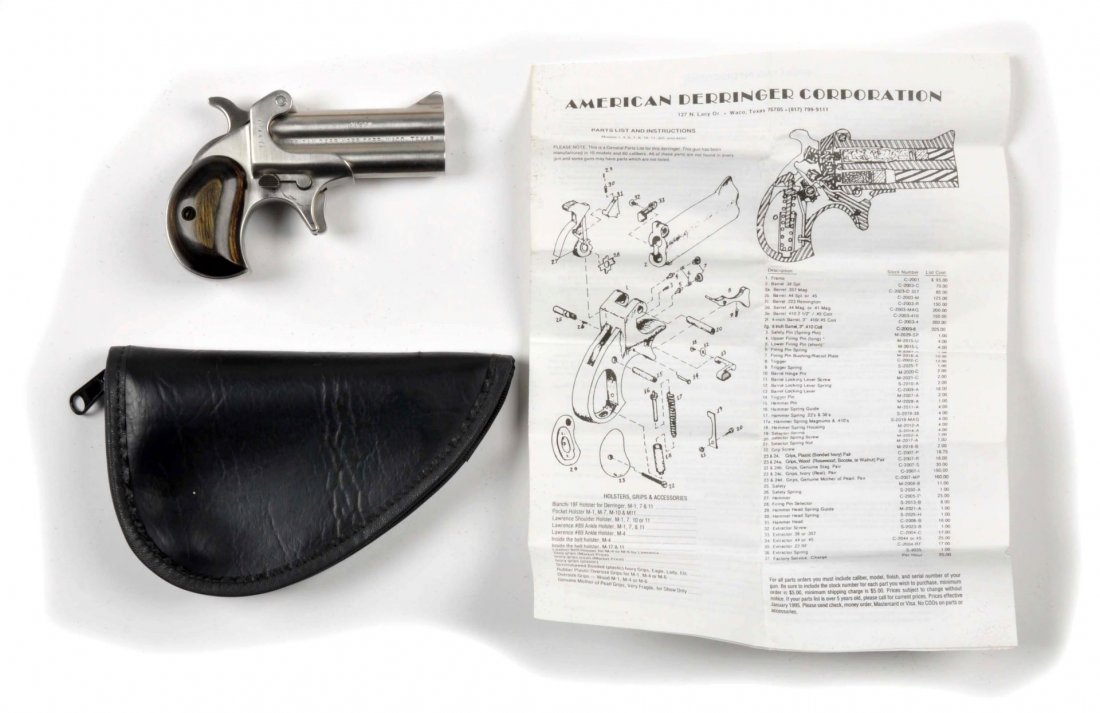 **American Derringer Over Under Pistol.: Serial # 121437 Finely made over under Deringer chambered for the .40 S&W cartridge, made of stainless steel, with a 3" barrel and wood grips. Patterned after the classic Remington. It was manufacture