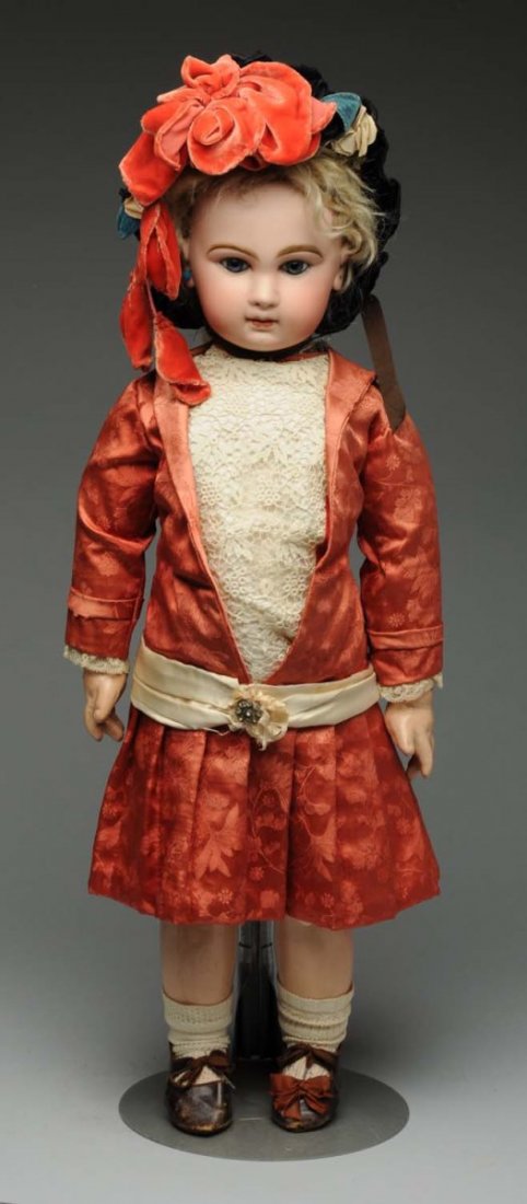 Delightful Jumeau Bébé Doll.: French bisque socket head fully marked in red “Depose Tete Jumeau Bte SGDG 12” with Jumeau checkmarks, multi-stroked eyebrows, violet eye shadow, blue paperweight eyes with lots of threading, pain