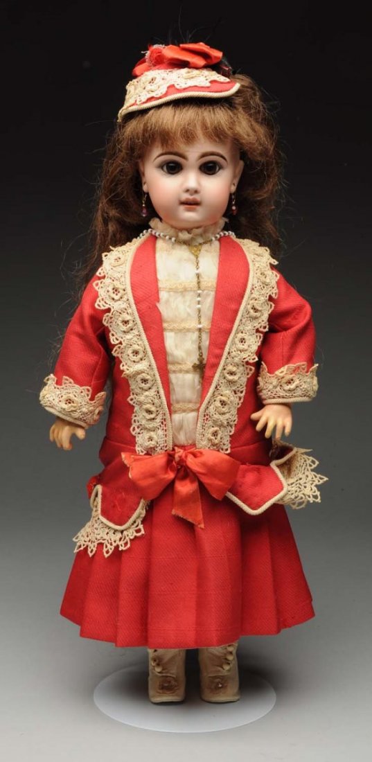 Pretty Jumeau Bébé Doll.: French bisque socket head with red stamp “Depose Tête Jumeau” with red checkmarks (light nose rubs), dark multistroked eyebrows, painted upper and lower lashes, blue paperweight eyes, pierced ear