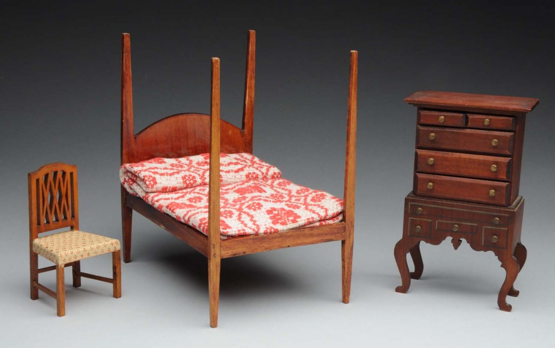 TynieToy 3 Piece Bedroom Set.: 1920's - 40's. Set is marked and includes four poster bed, chair and chest of drawers. Condition (Excellent). Size Tallest: 7 - 1/2".