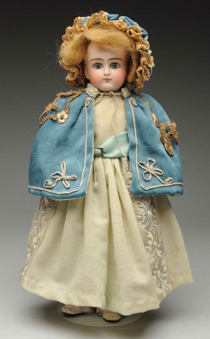 Pouty Belton-Type Doll.: German bisque socket head with solid dome and 3 stringing holes (lots of wig pulls, neck socket has several pieces missing), blue paperweight eyes, closed mouth, hank of mohair for a wig; original ear