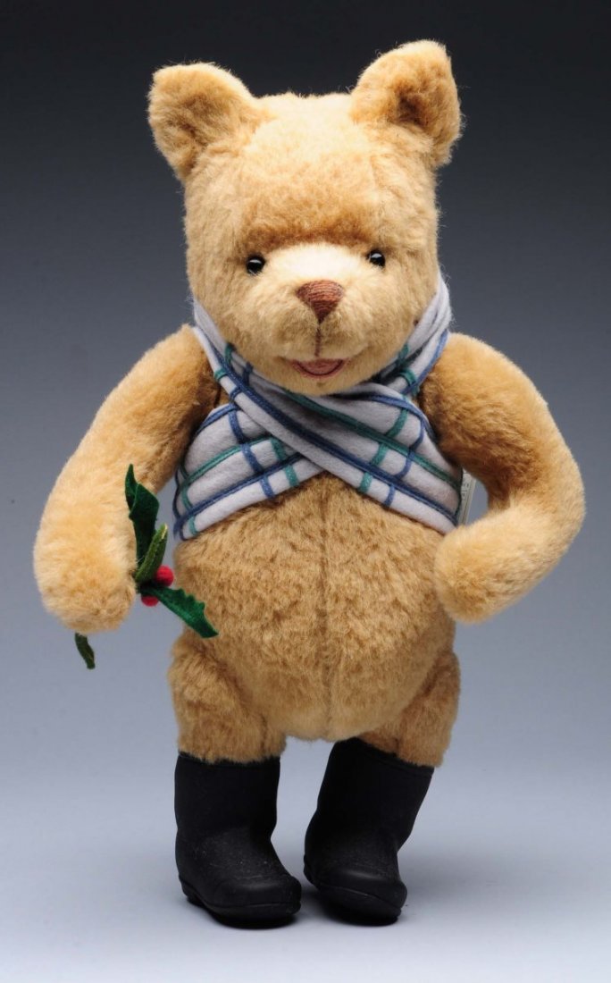 R. John Wright “Holiday Pooh”.: Made exclusively for the Walt Disney World Teddy Bear & Doll Convention in 1997, No. 487, all original in box with certificate. Condition (Excellent). Size 13" T.