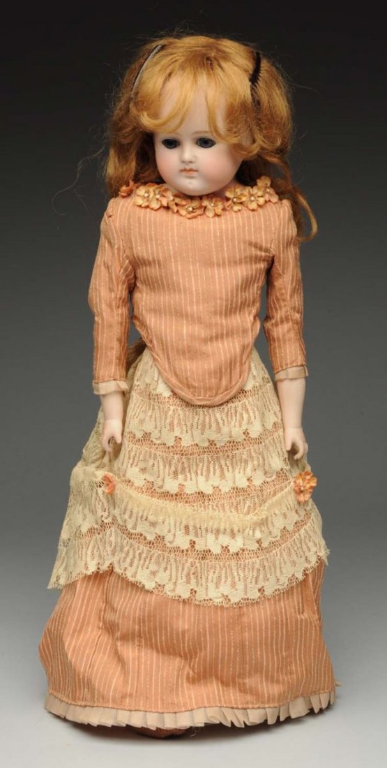 Charming German Lady Doll.: Bisque solid dome shoulder head with turned face probably by Alt, Beck & Gottschalck, multistroked eyebrows, glass stationary eyes, closed mouth, mohair wig; original kid body (soil, wear) with bisque