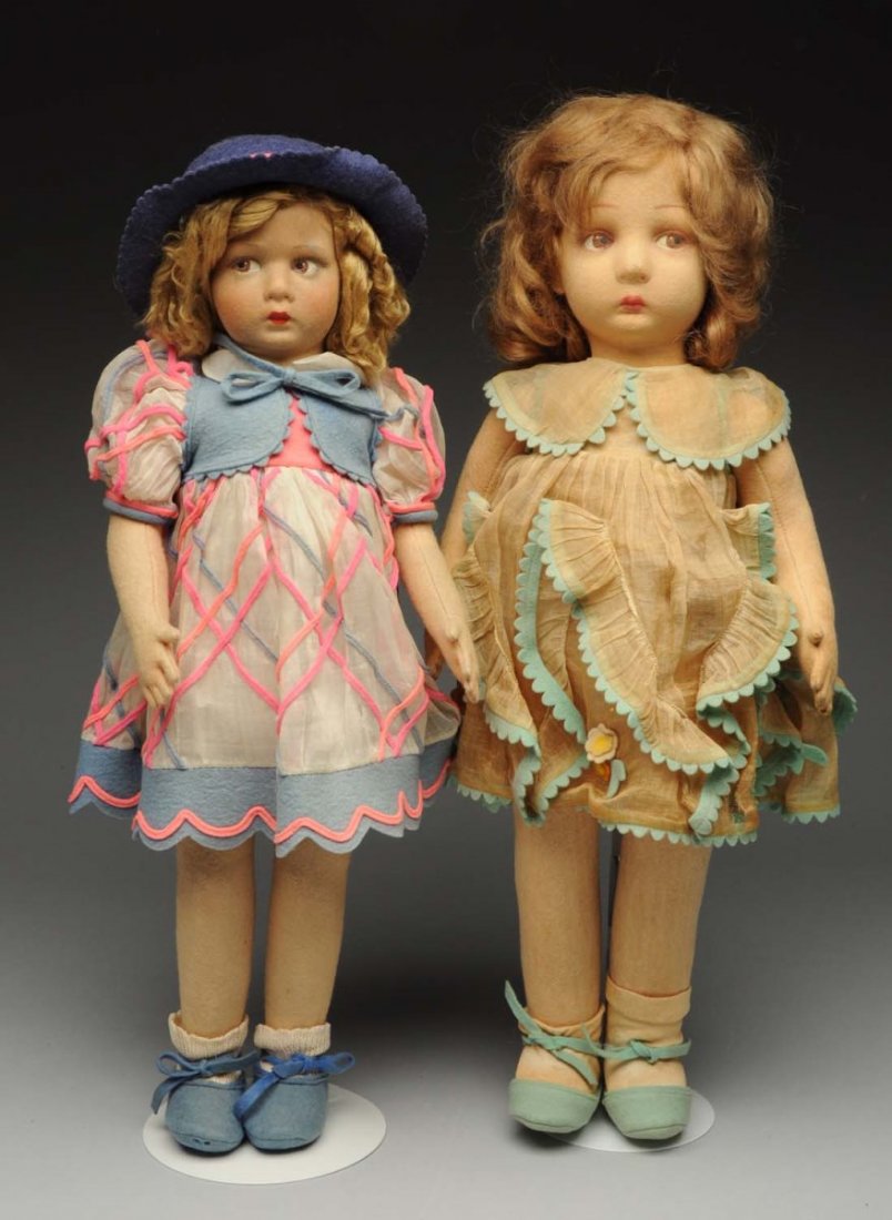 Lot Of 2: Lenci Dolls.: Girl in pink and blue has original dress, undies, shoes and socks (needs her hair styled, some soil on arms and legs); girl in organdy has original dress but yellowed with a few splits (squashed nose,