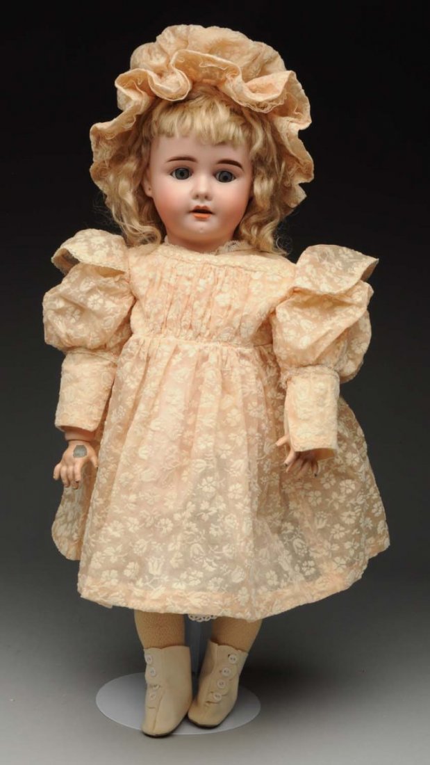 Rare RA Child Doll.: German bisque socket head incised “RA DEP” made by Recknagle with lovely bisque, multistroked eyebrows, sleeping eyes, open mouth with lip shading strokes and upper teeth, chin dimple, pierced ear