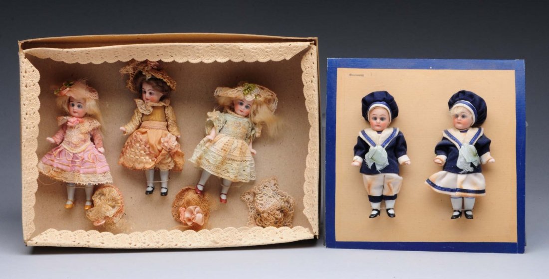 Lot Of 2 Sets of Reproduction Dolls.