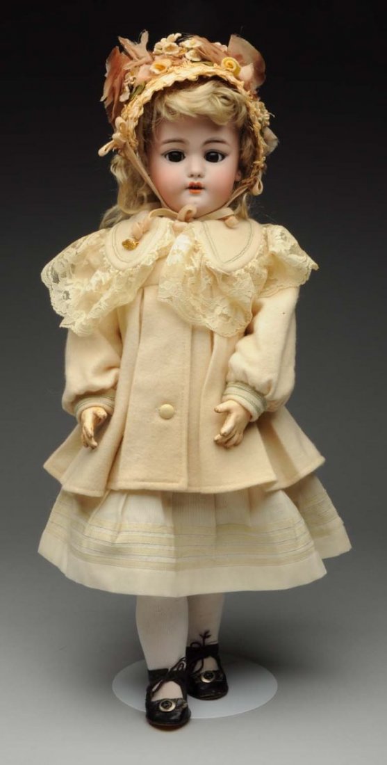 Pretty S & H Child Doll.: German bisque socket head incised “ S & H 1079 Dep Germany 8” with multistroked eyebrows, sleeping eyes (small eye chip), painted lashes, open mouth with teeth, chin dimple, pierced ears, plaster