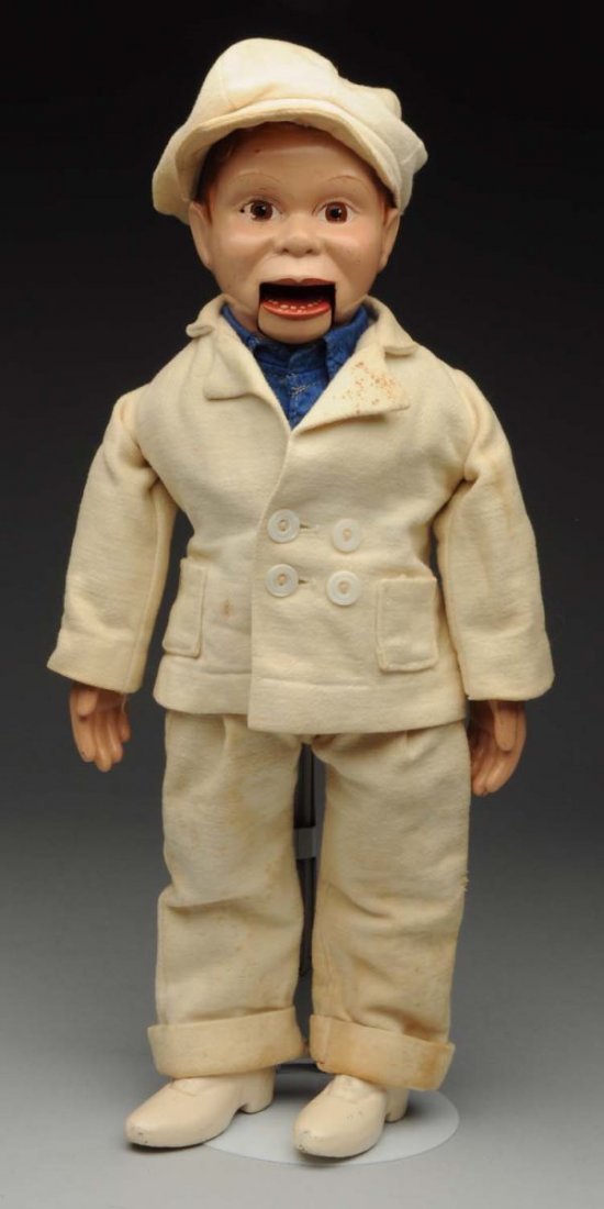 Effanbee “Charlie McCarthy” Ventriloquist Doll.: Composition head with molded hair, painted eyes (some wear and flaking, mouth string doesn’t work), cloth body with composition hands and lower legs and feet with molded shoes; original white wool s