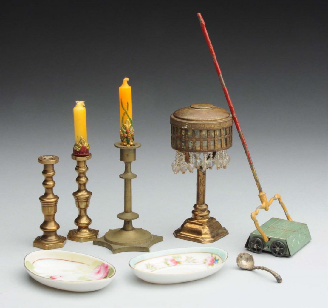 Lot Of 8: Antique Doll House Accessories.: Lot consist of two hand painted Nippon platters, a silver ladle, three brass candle sticks with three ornate candles, a fabulous metal table lamp with shade and beaded decorations, and a metal hand sw