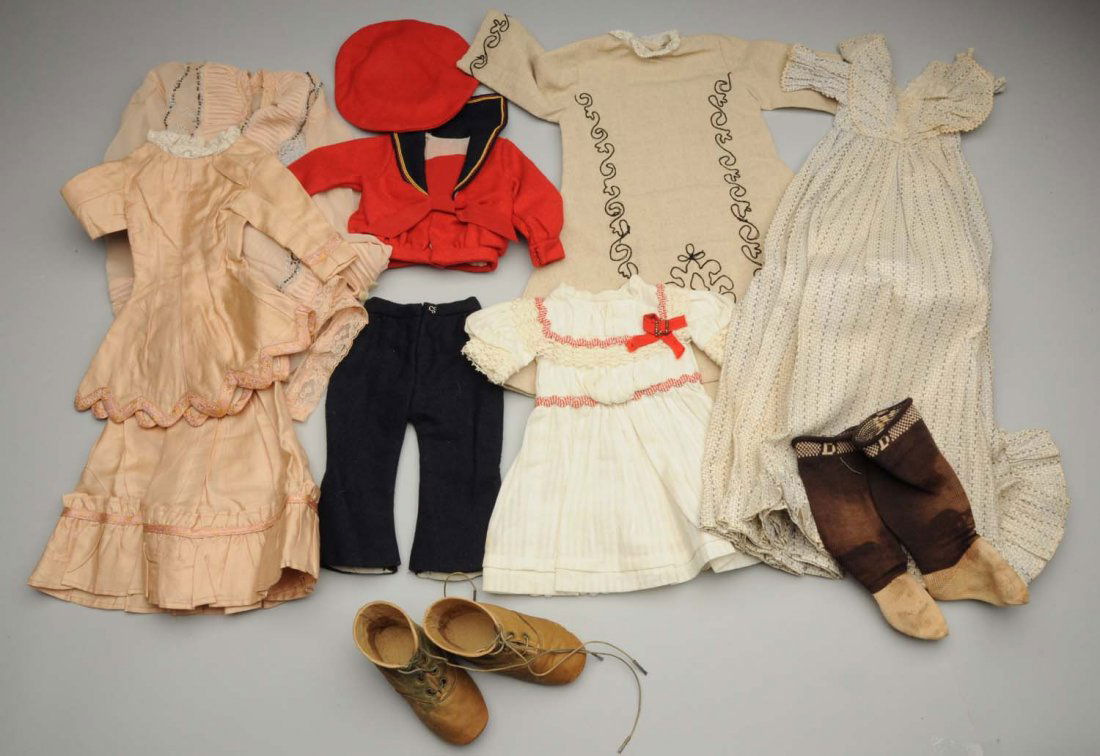 Lot Of Clothing For Antique Dolls.: Antique items include: leather lace-up boots, “B” cotton stockings, striped cotton baby dress, two collars, six undergarments, baby hat, chiffon beaded blouse. New items appropriate for antique do