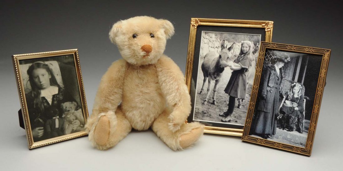 Steiff White Mohair Teddy Bear.: With shoe-button eyes, very good mohair with minor wear to mohair on left side of face, and "FF" button in ear. Circa 1907. Includes photos and a brief history of original owner. Condition (Very Good)