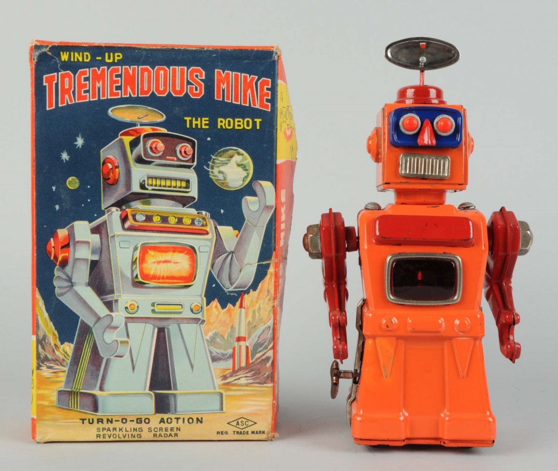 Japanese Tin Litho Tremendous Mike Robot.: In original box. Wind - up. Made in Japan by Aoshin Shoten. Rare toy in extremely rare box. Has radar dish on top of head, wind - up is working and it does spark. Robot has some scratching to front si