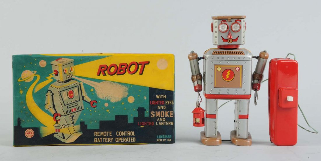 Japanese Tin Litho Powder/Lantern Robot.: Battery - operated. In original box. Remote control. Made in Japan by Linemar. Box has nice colored graphics, does have some professional restoration near the corners of the front of the box. One smal