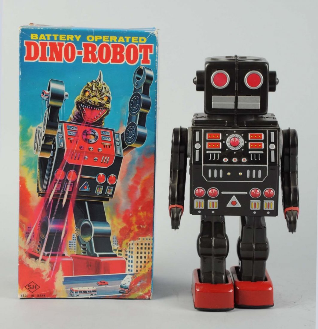 Japanese Battery - Operated Tin Litho Dino Robot.: In original box. Made in Japan by Horikawa. Box has nice street scene depiction. Some creasing to edges of box. Box is nice, bright and glossy. Robot has minor crazing and wear around chest plate. Rob