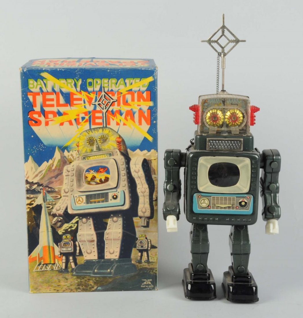 Japanese Tin Litho Television Spaceman.: Battery - Operated. In original box, has great graphics and cardboard inserts. Made in Japan by Alps. Tin battery door version. No cracking to faceplate, one small line in upper left top. Some minor t