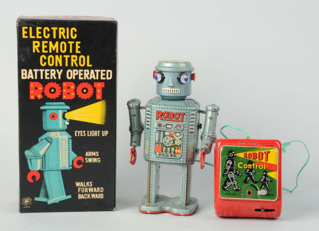 Japanese Tin Litho R - 35 Robot.: Battery - operated. In original box. Remote control which has nice colored graphics with robots walking. Box is very clean with only light creasing and wear. Also, minimal wear to robot. Condition (Ex
