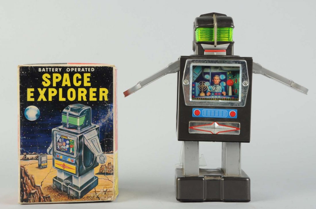 Japanese Tin Litho Space Explorer Robot.: Battery - operated. In original box. Made in Japan by Yonezawa. Robot works correctly. Box has some moderate creasing throughout. Toy has some oxidation on bare metal parts, and some scratching on arm