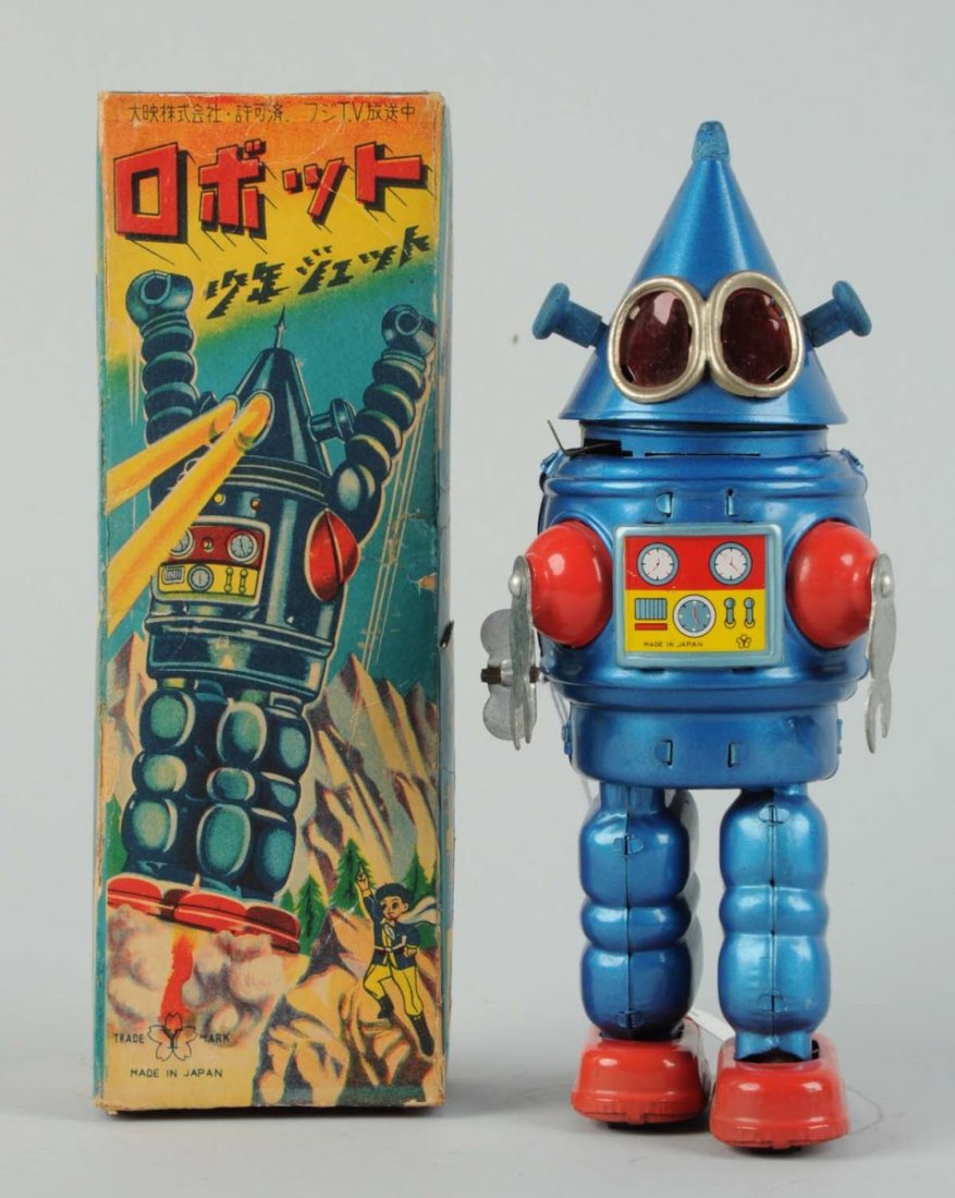 Japanese Tin Litho "Cone Head" Robot.: In original box. Wind - up. Made in Japan by Yonezawa. Extremely rare box, only a few examples known. Japanese writing on top. Beautiful depiction of robot, complete, no tearing but does have some cre