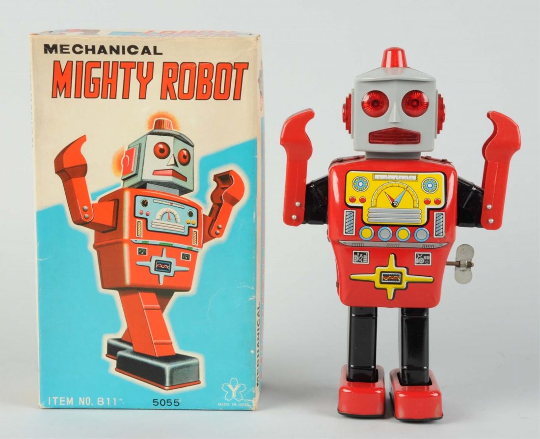 Japanese Tin Litho Mechanical Mighty Robot.: In original box. Wind - Up. Made in Japan by Yonezawa. One small poke hole on bottom of box on back. Robot has plastic head and arms, body is tin litho. Minimal wear to robot. Some slight creasing to 