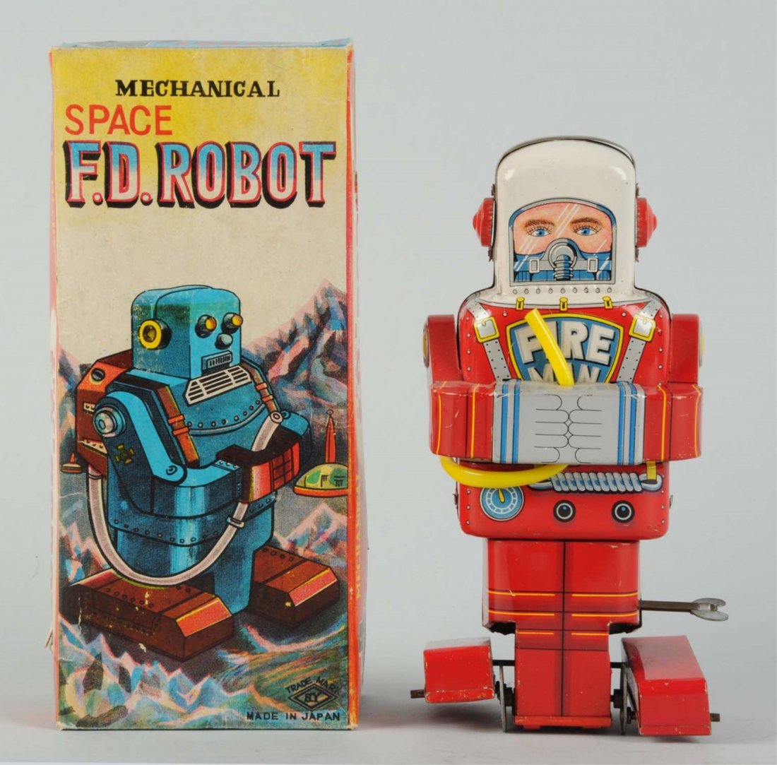Japanese Tin Litho Space Man F. D Fireman Robot.: In original box. Wind - up. Made in Japan by Yoneya. This is the no hat version. Robot and box are both different than the version with hat. Box has a small piece of tape on bottom right corner. Some 