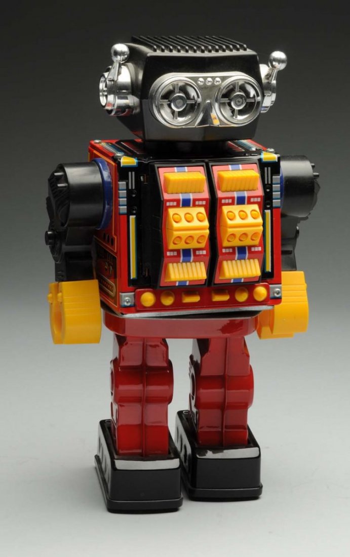 Lot of 2: Japanese Battery Operated Robots.: Includes both original boxes. More contemporary Japanese writing on both. Very little wear. Made by S.H, Japan. One has all original missiles, the other has a chest that opens up with guns. Condition 