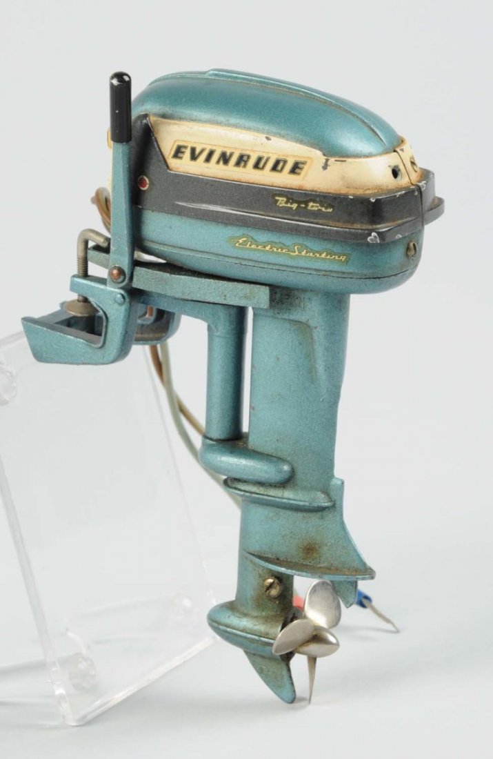 Japanese Battery-Operated Evinrude Toy Boat Motor.: Has decals on sides. Marked "Big Twin". Some chipping and wear. Missing one screw on top. Condition (Very Good). Size 5 - 3/4" L.