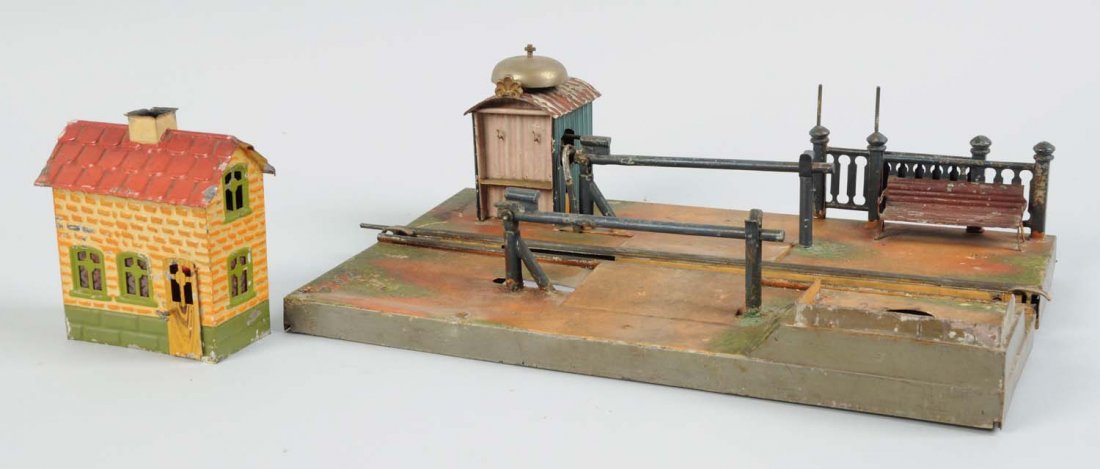 Marklin Crossing Station.: Complete and all original, has scratches and paint chips throughout. One fence will have to be reattached. Condition (Very Good).