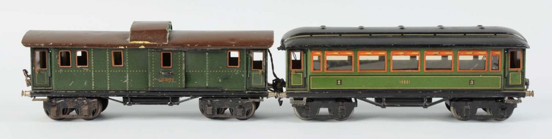Marklin 1 Gauge Passenger Car & Caboose.: Passenger car, complete and all original, has had one step broken off, some scratches and paint chips but very good condition. Caboose, complete and all original, has some small dents on roof, some sc