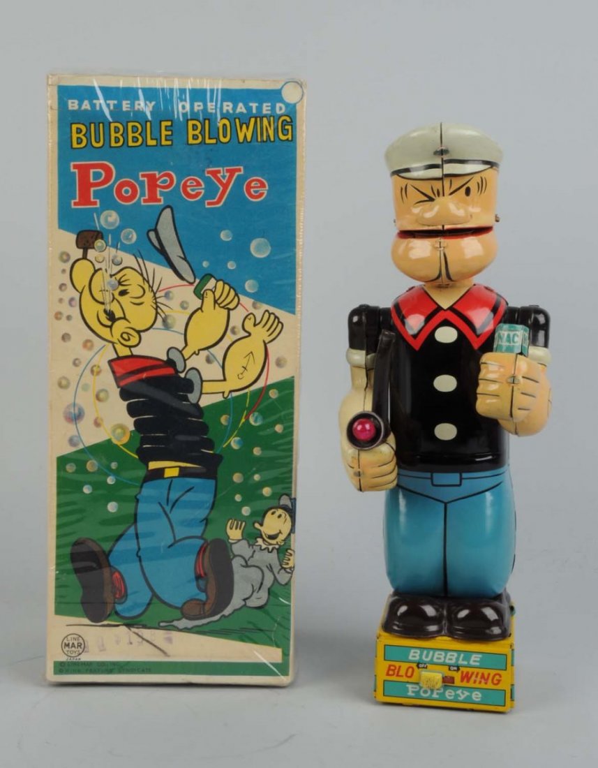 Linemar Battery-Operated Bubble Blowing Popeye.: Includes original box, which is complete but does have some creasing to top portion. Nice graphics showing Swee'Pea on box with Popeye. Toy itself works well. Pipe lights up. Does have some restoratio